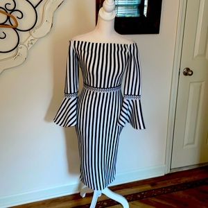 Black and white spandex dress. Shows curves